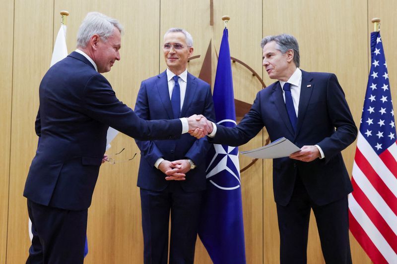 The Finnish president Sauli Niinisto (left)shakes hands with U.S. Secretary of State Antony Blinken (right) at the ceremony of Finland joining NATO this month. 