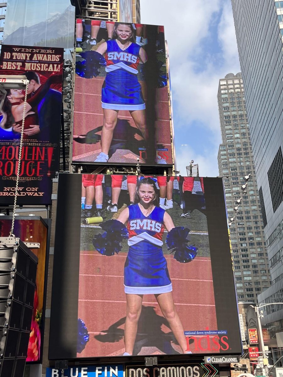 Grace Gernser projected on a billboard in Times Square