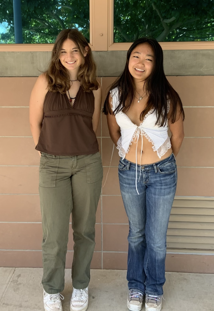 Sophomore Amber Coltrin (left) and Senior Victoria Chow (right) showing off their fall outfits
