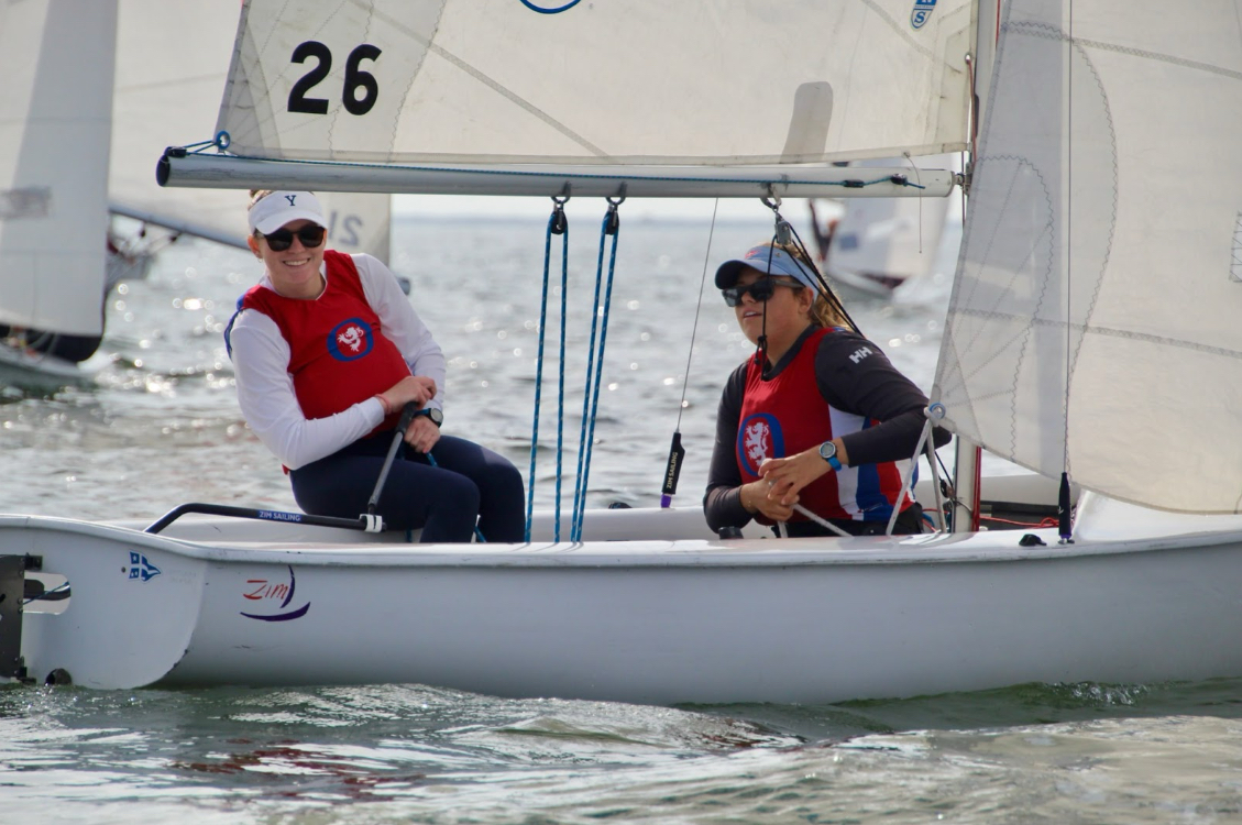 Carly Kieding and Taylor Escola sailing in a regatta 
